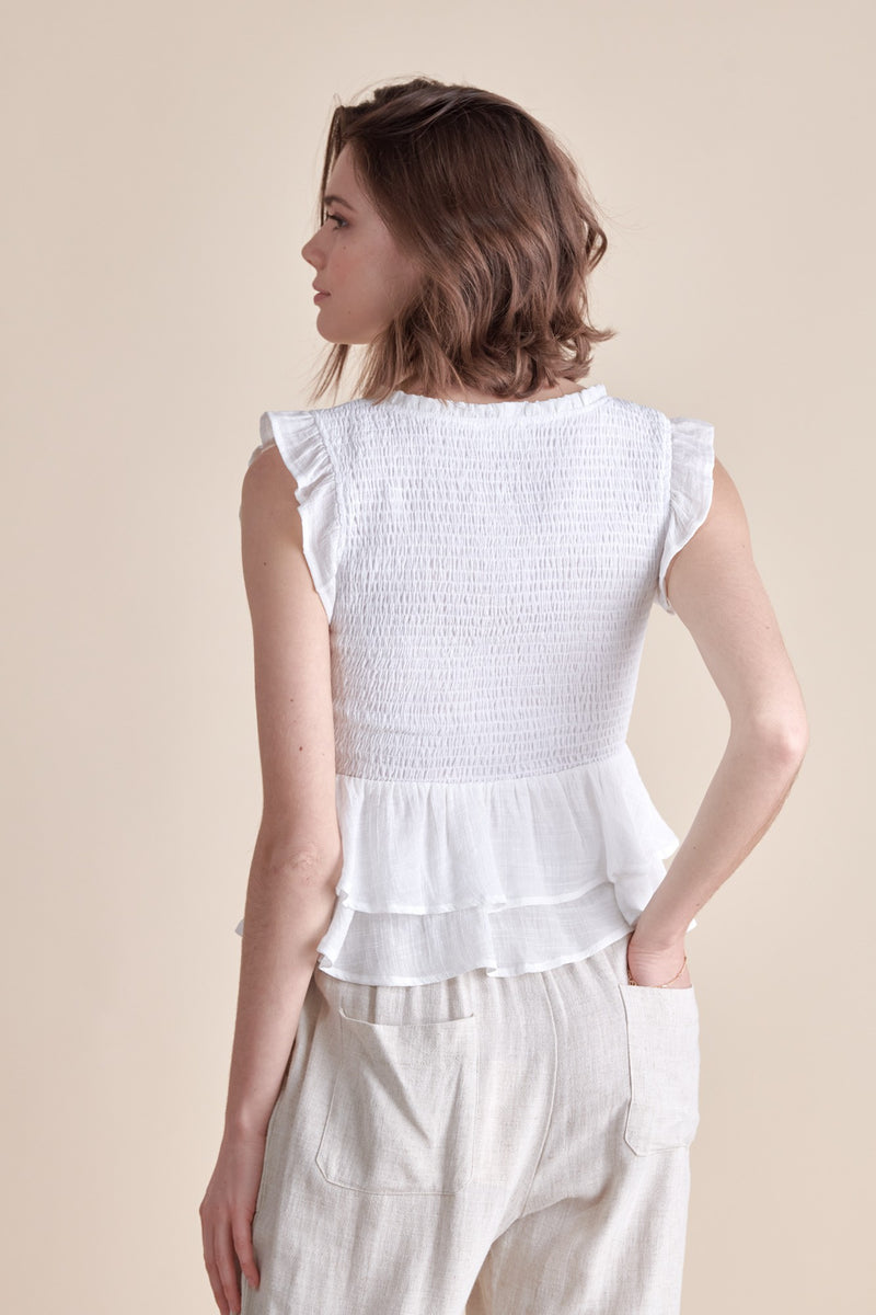 The Smocked Lace-up Top with Ruffle Detail in White
